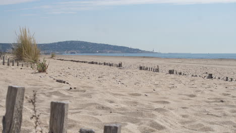 Sandy-beach-landscape-Sete-wooden-fence-mont-saint-clair-mediterranean-sea
